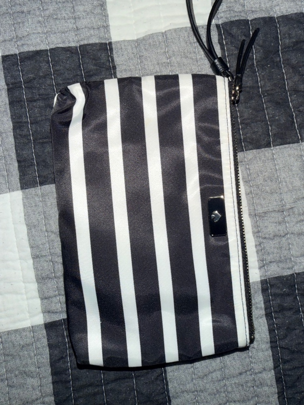 Kate Spade black/white striped wristlet